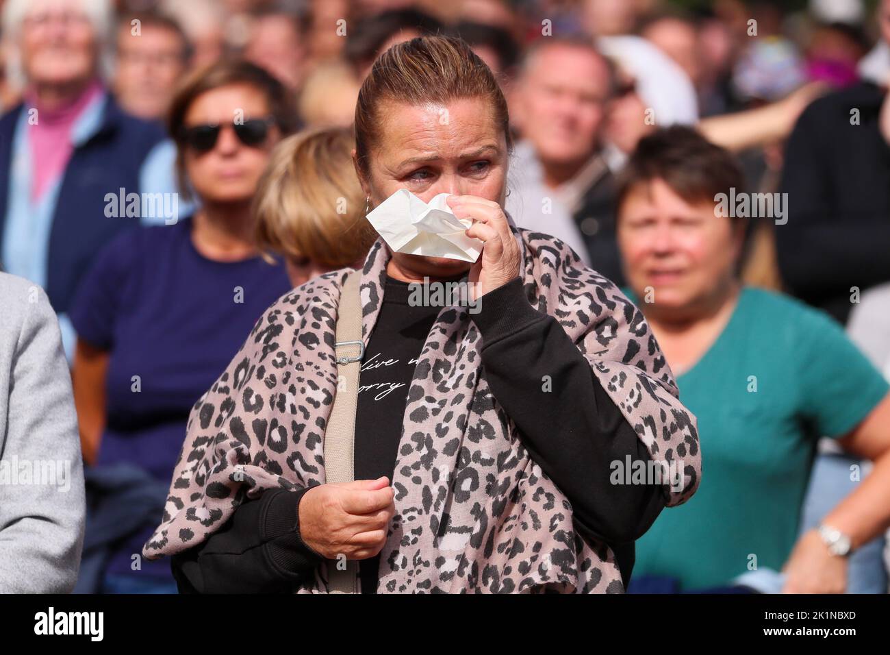 Thousands of members of the public watch the state funeral of Queen Elizabeth II on big screens in London's Hyde Park. Stock Photo