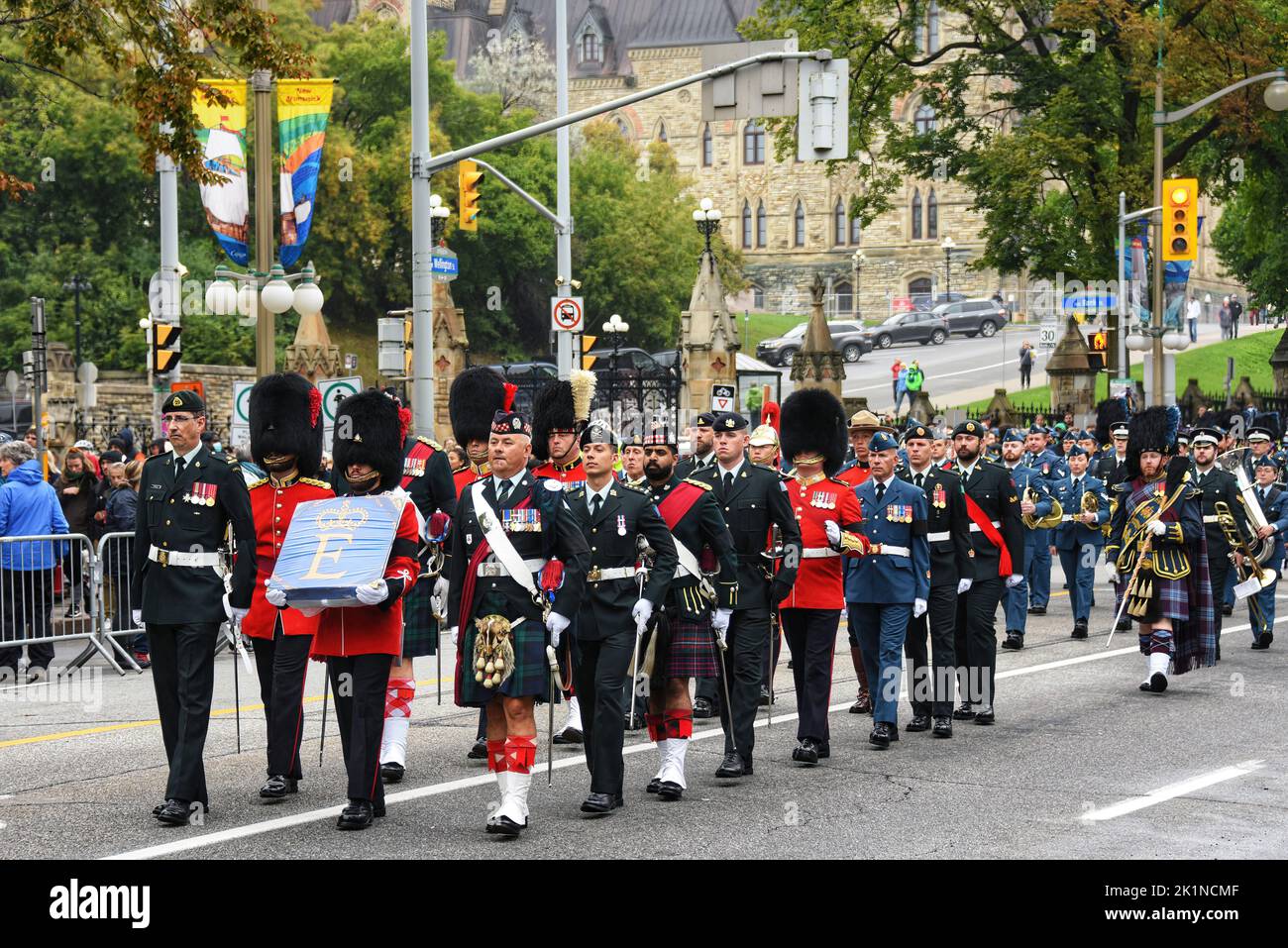 Ottawa, Canada - September 19, 2022: Members of Canadian military march during a memorial parade on Wellington Street heading towards Christ Cathedral an Anglican church for a commemorative ceremony for the funeral of Queen Elizabeth II. The federal government declared the day a federal holiday and a national day of mourning for the Queen, with federal public servants having the day off. Stock Photo