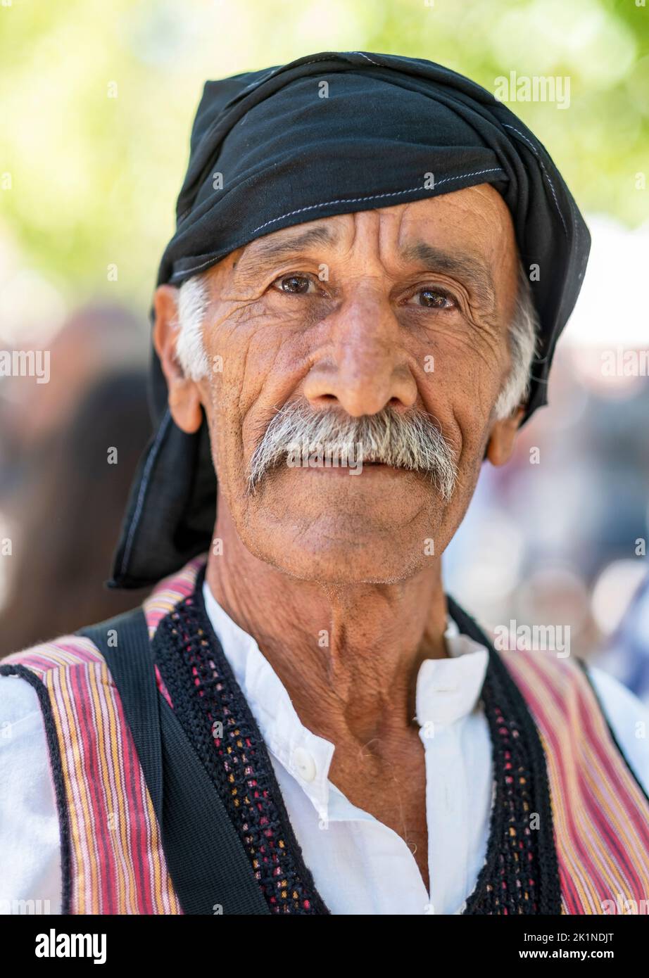 Portrait of a Cypriot man in traditional dress at the Statos-Agios Fotios Rural Festival, Paphos region, Cyprus. Stock Photo