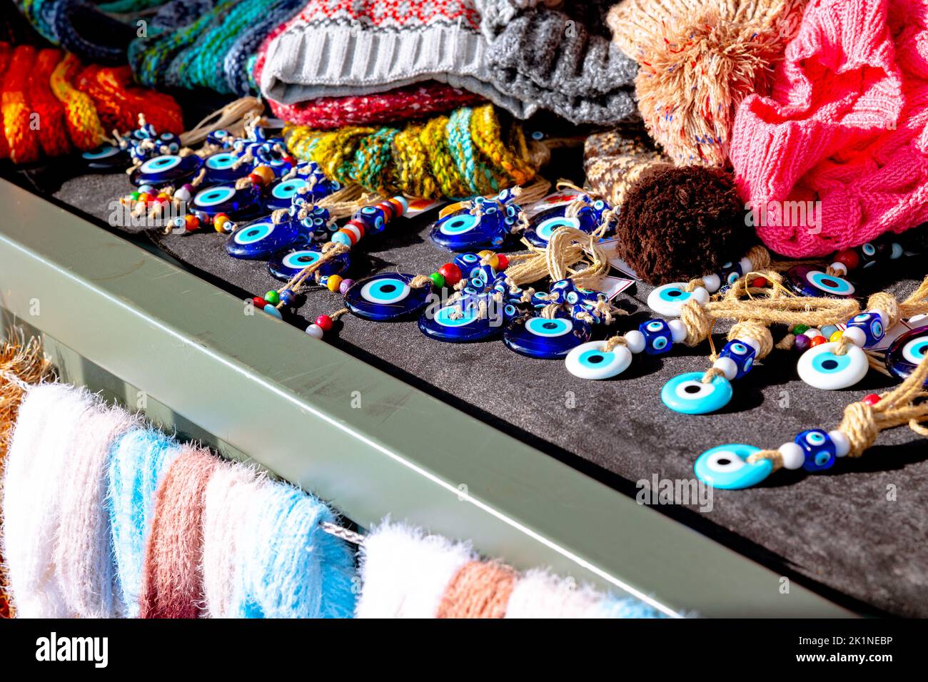 Evil eye beads or nazar boncugu. Turkish style souvenirs in a shop. Travel to Turkey background photo. Stock Photo
