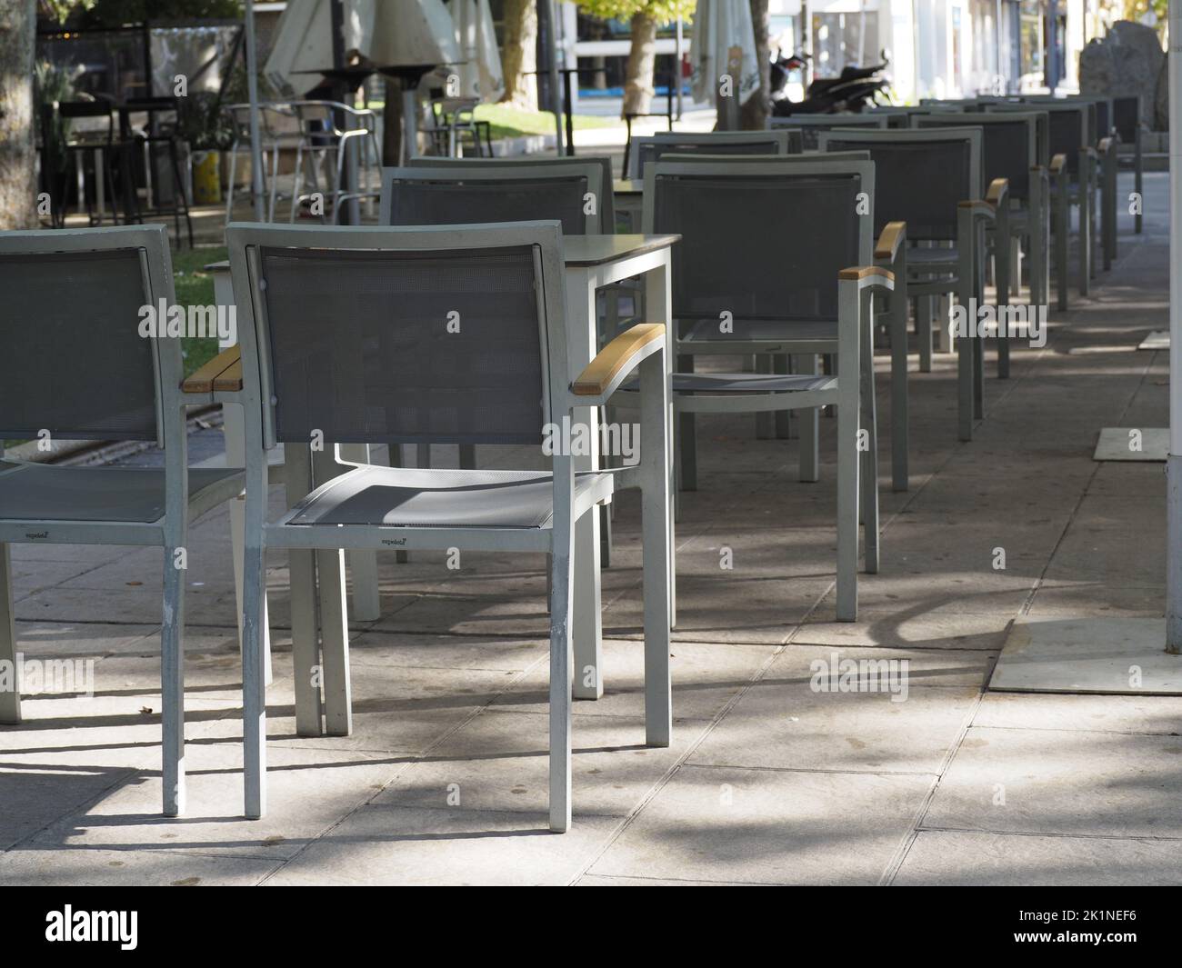 terrace of a cafe deserted due to the effects of inflation. Stock Photo
