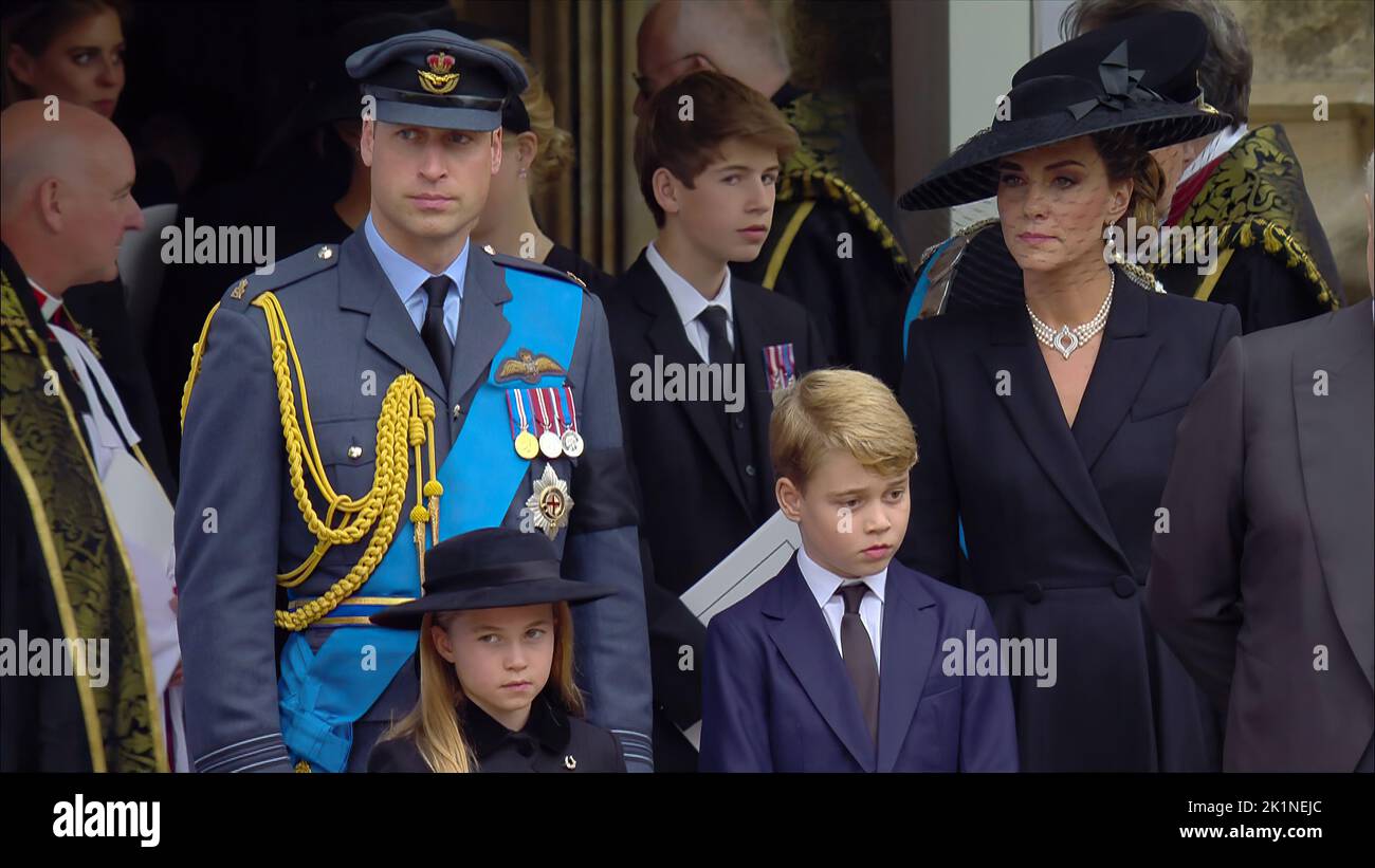 Queen’s State Funeral 19.9.22 St George’s Chapel Prince Willam and Kate leave with Prince George and Princess Charlotte  on leaving the Chapel  Pictur Stock Photo