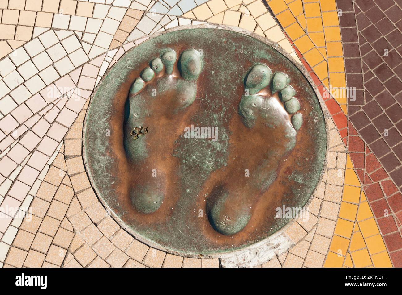 Iifracombe-Devon-England-2022-The mould of Johathan Edwards the triple jumper's landed feet. Stock Photo