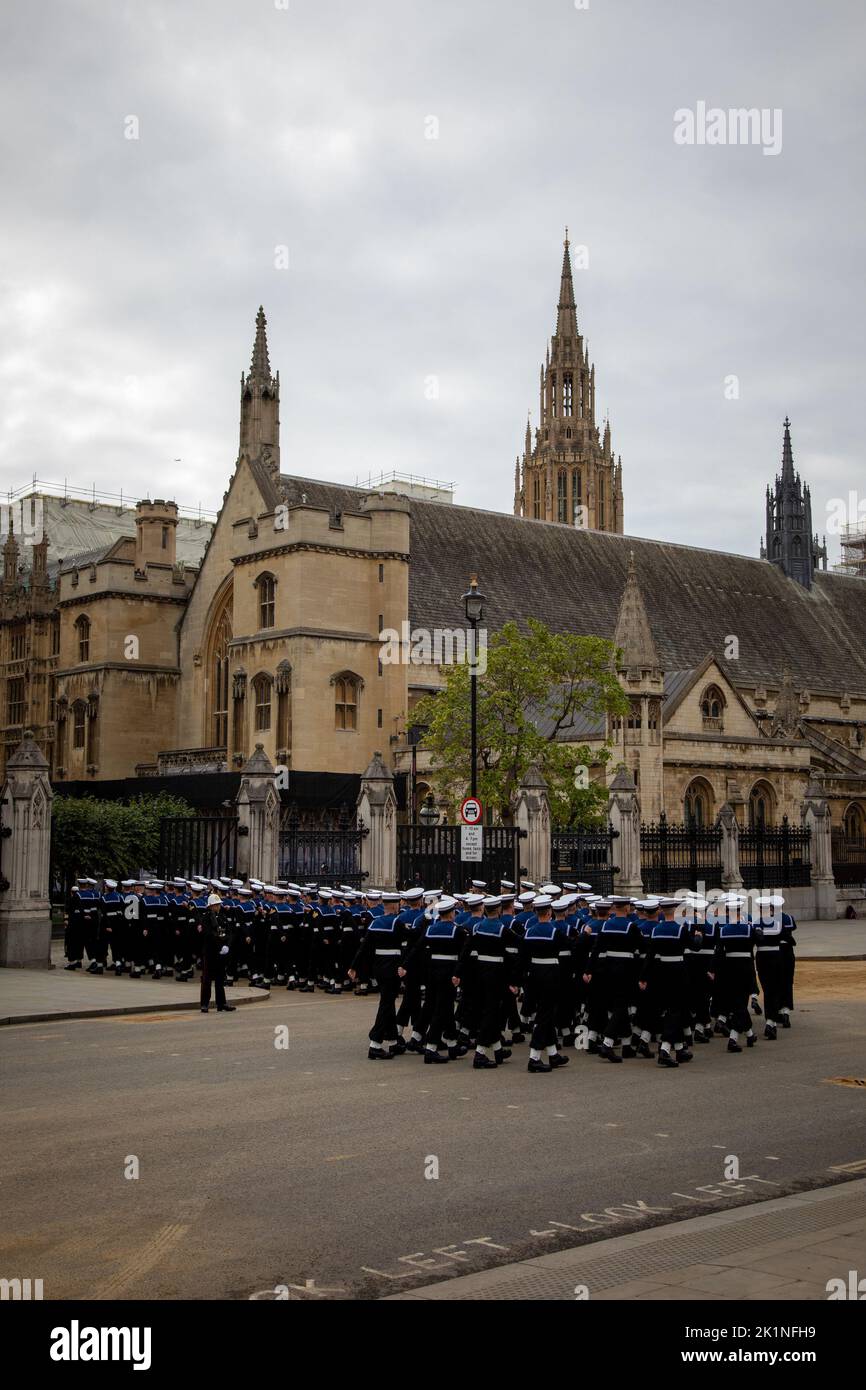 London, England. 19th September, 2022. Members of the Royal Navy march into the gates of the Palace of Westminster to pick up the coffin of her Majesty the Queen Elizabet II for her State Funeral. The event was held in London and Windsor today and was one of the biggest the country has ever seen. Credit: Kiki Streitberger / Alamy Live News Stock Photo
