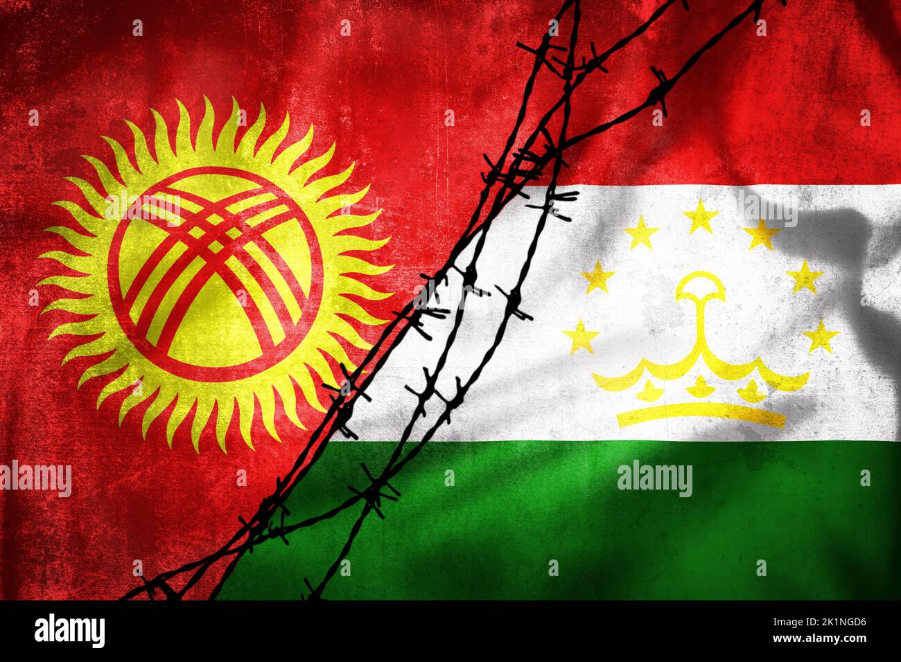 Grunge flags of Kyrgyzstan and Tajikistan divided by barb wire illustration, concept of tense relations between two countries Stock Photo