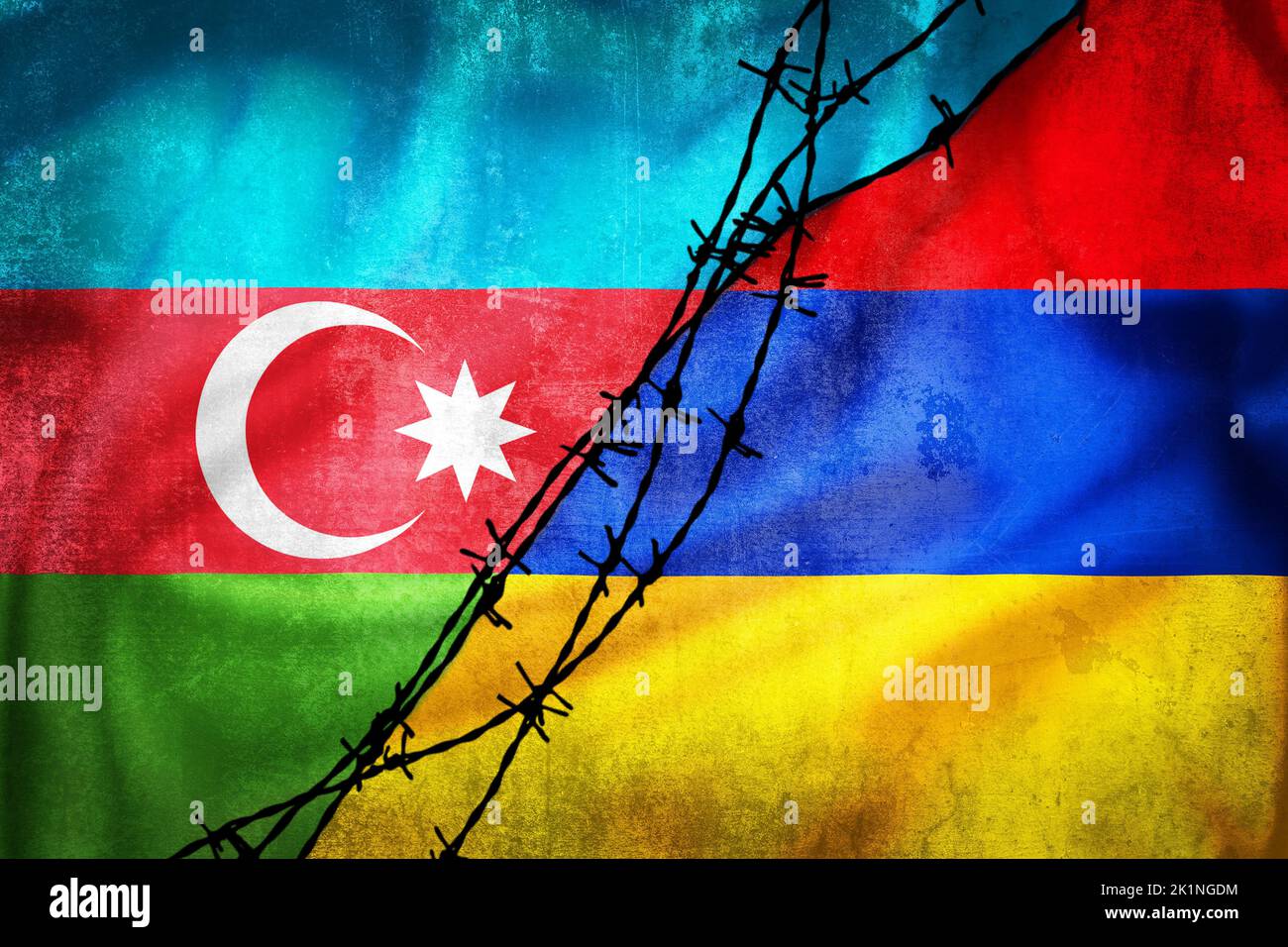 Grunge flags of Azerbaijan and Armenia divided by barb wire illustration, concept of tense relations between two countries Stock Photo