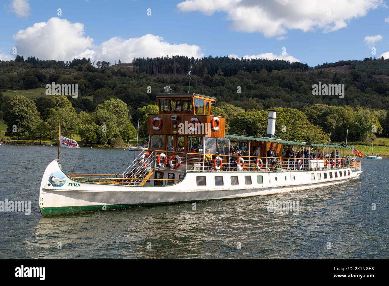 Lakeside, Lake Windermere, Lake District, Cumbria. MV Tern gets ready to dock at lakeside on a sunny Autumn day. Stock Photo