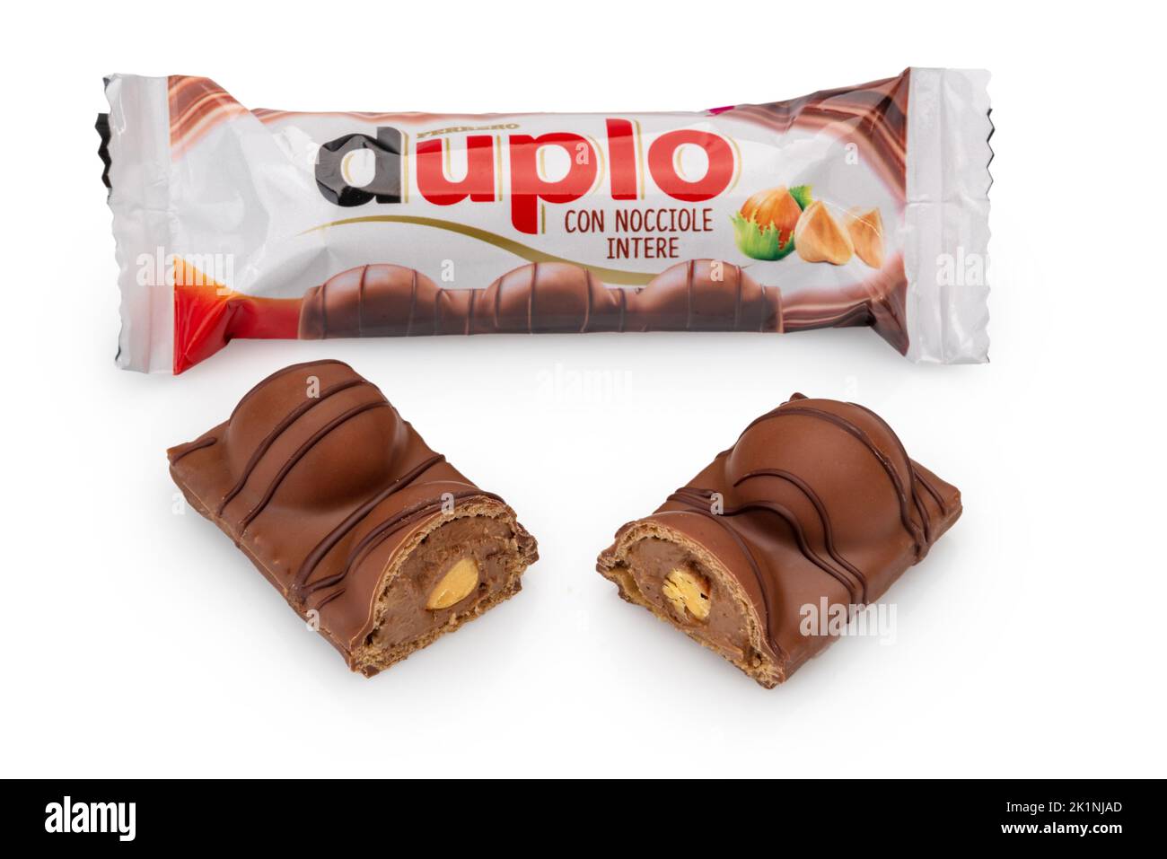 Alba, Italy - September 19, 2022: Duplo Ferrero chocolate bar filled with chocolate cream and whole hazelnut. Italian Pack with chocolate bar cut isol Stock Photo