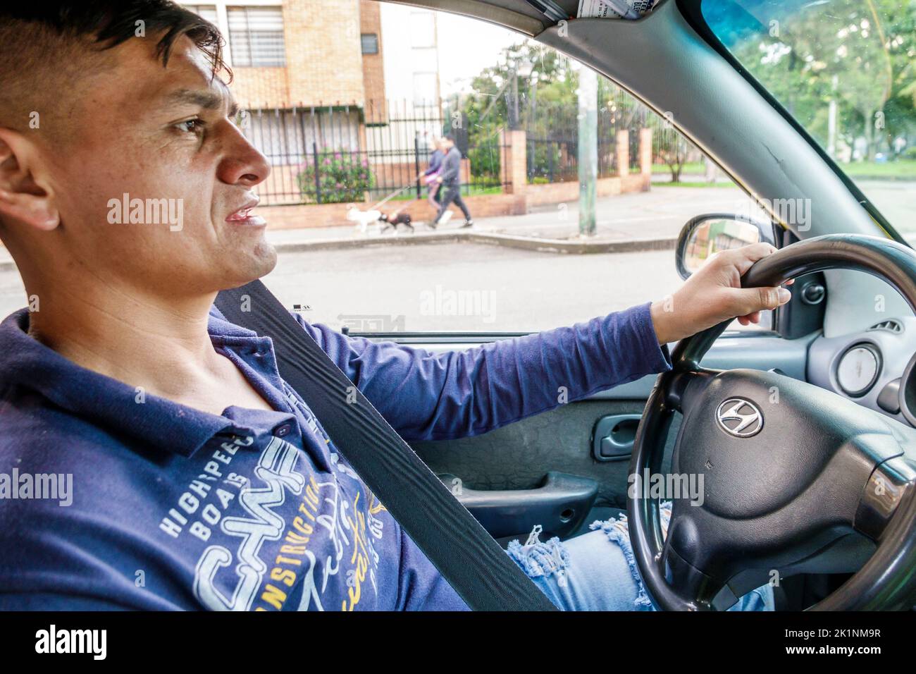 Bogota Colombia,Avenida El Dorado taxi cab driver,man men male driving working,Colombian Colombians Hispanic Hispanics South America Latin American Am Stock Photo