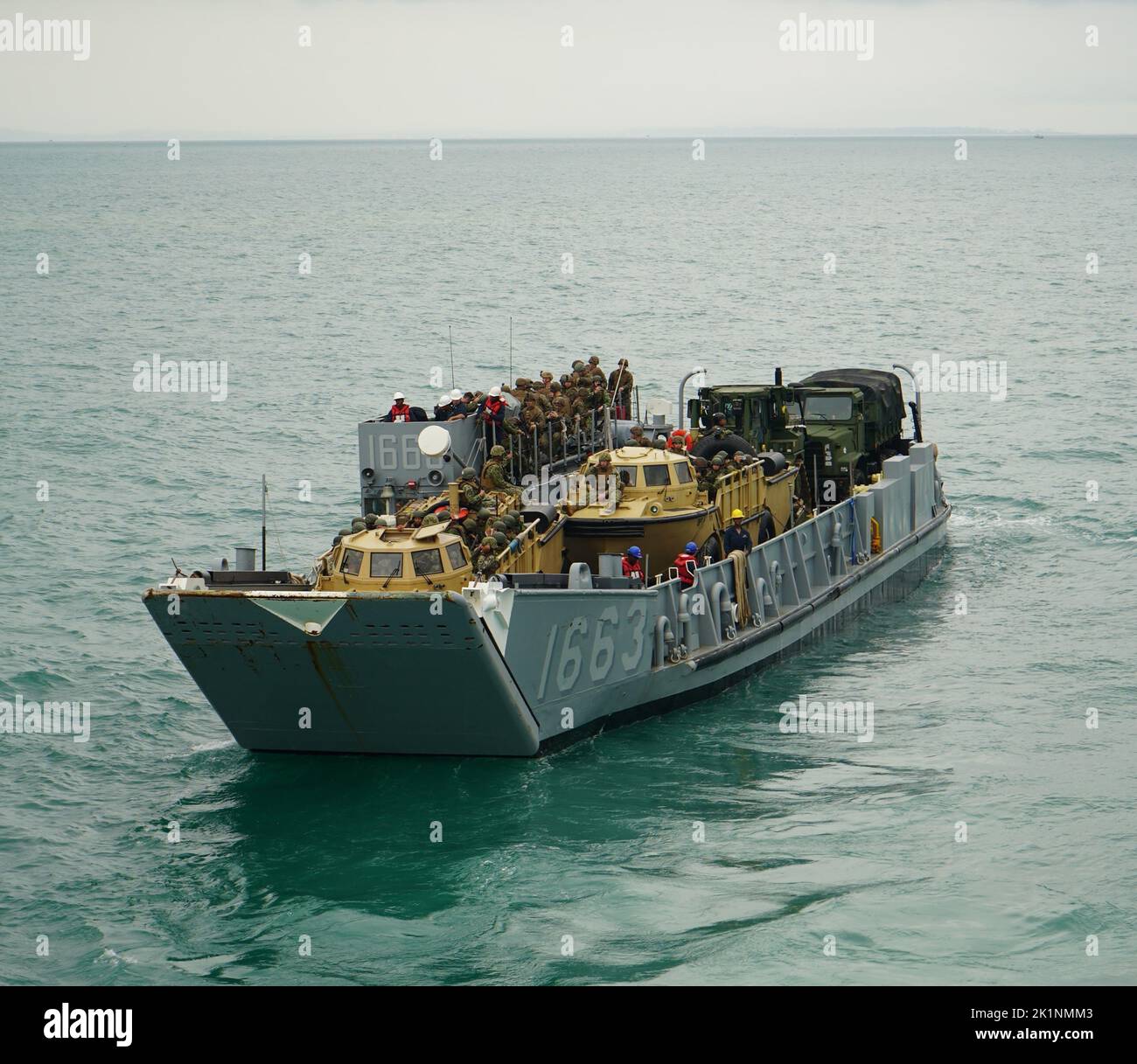Landing Craft Unit (LCU) 1663, assigned to the USS Mesa Verde (LPD-19), carries United States, Brazilian, Uruguayan, and Chilean Marines along with vehicles, gear, equipment toward the coastline of Itaoca, Brazil as the first wave of an international, joint, and combined amphibious landing during the culminating event of exercise UNITAS LXIII, Sept. 16, 2022. UNITAS, which is Latin for ‘unity,’ is the world's longest-running annual multinational maritime exercise that brings together forces from 19 countries to include Brazil, Cameroon, Chile, Colombia, Dominican Republic, Ecuador, France, Guy Stock Photo