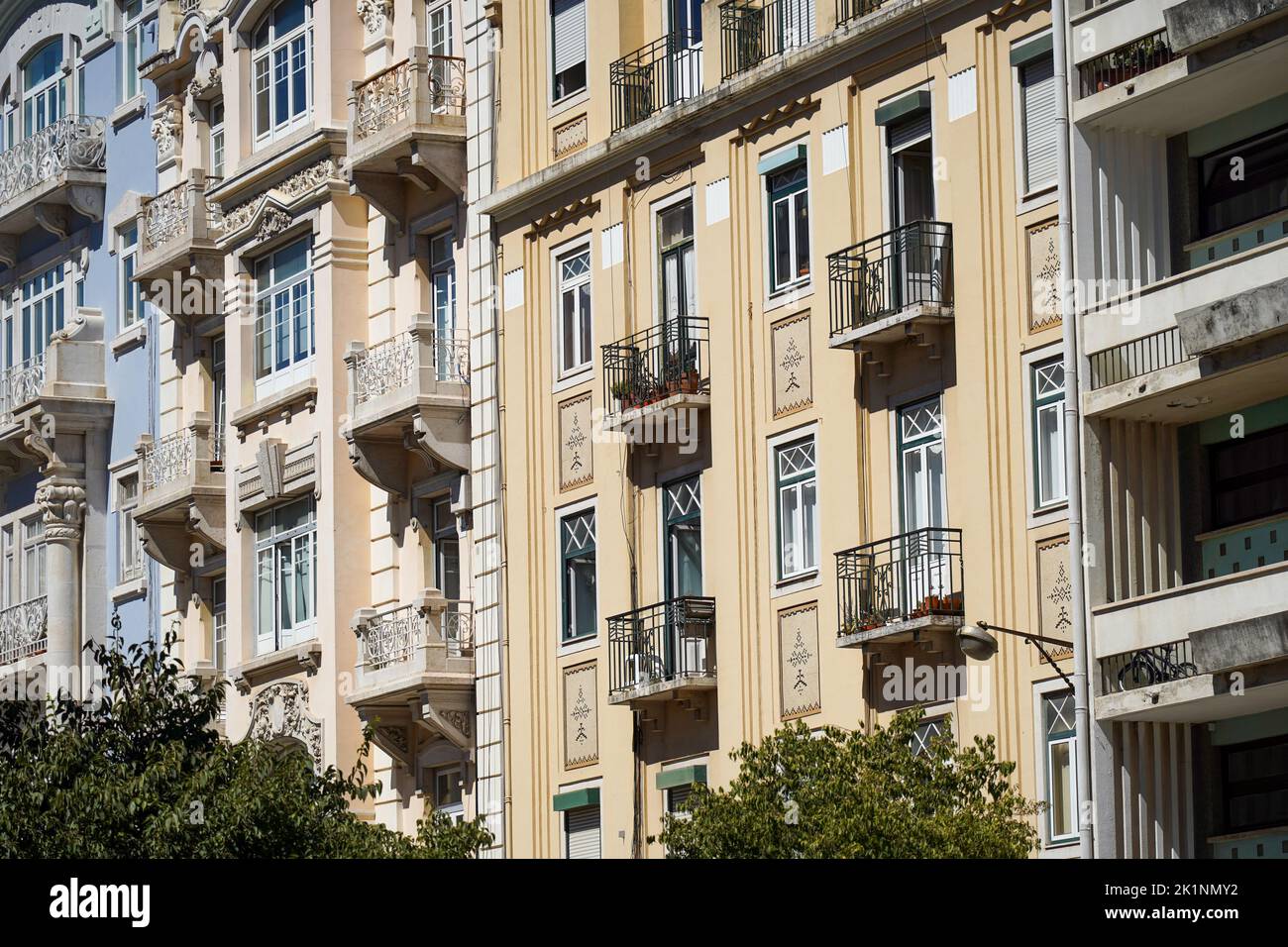 Beautiful Lisbon apartments facades, with old windows and balconies. European architecture Stock
