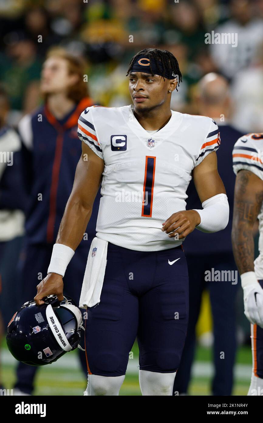 GREEN BAY, WI - SEPTEMBER 18: Chicago Bears quarterback Justin Fields (1)  runs during a game between the Green Bay Packers and the Chicago Bears on September  18, 2022 at Lambeau Field