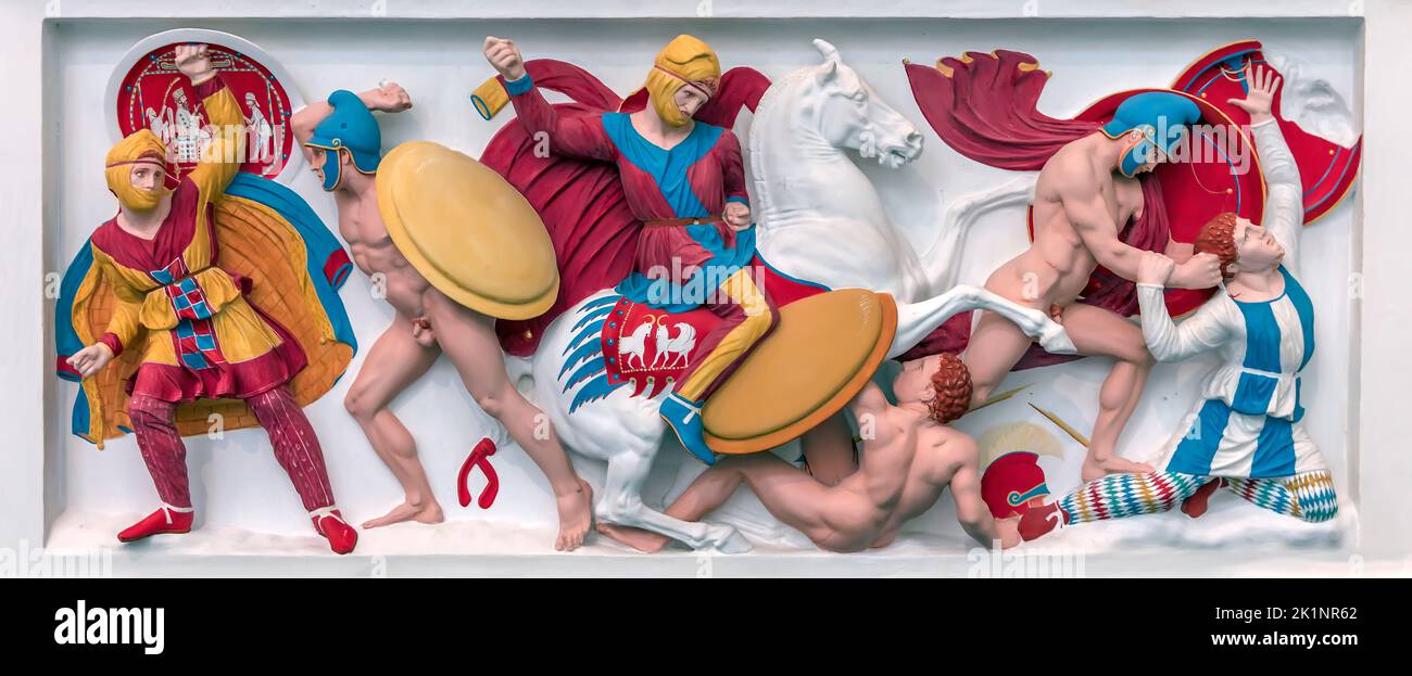 Reconstruction of one side of the so-called Alexander Sarcophagus with battle between Greeks and Persians showing believed original colours displayed Stock Photo