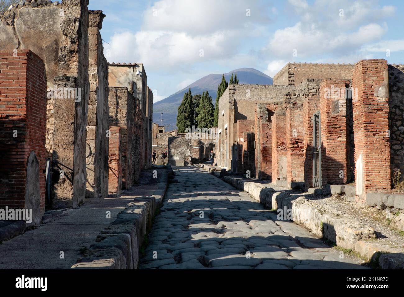 Mount Vesuvius looms over the archaeological park / town of Pompeii, a UNESCO World Heritage Site, Naples, Italy Stock Photo