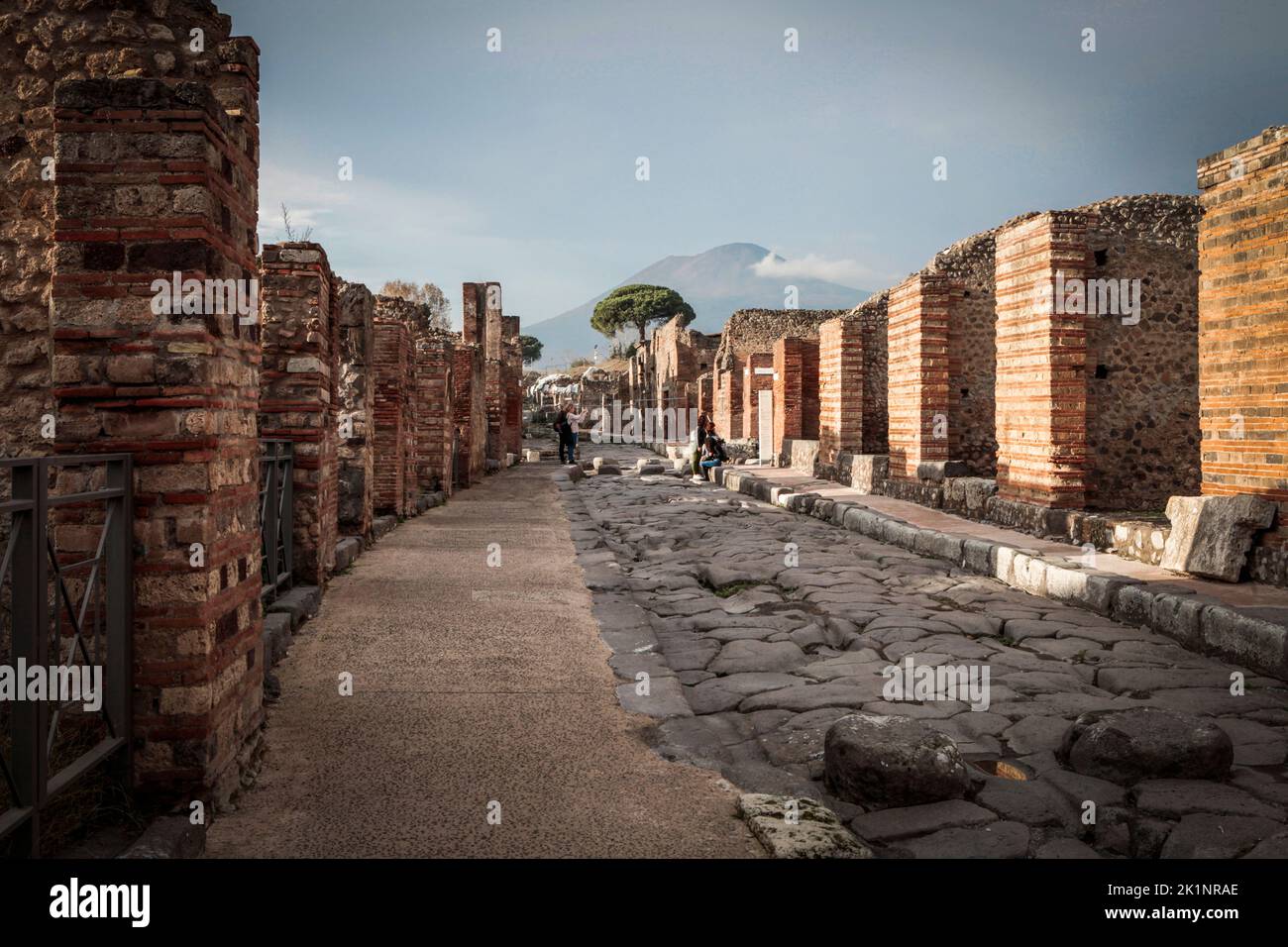 Mount Vesuvius looms over the archaeological park / town of Pompeii, a UNESCO World Heritage Site, Naples, Italy Stock Photo