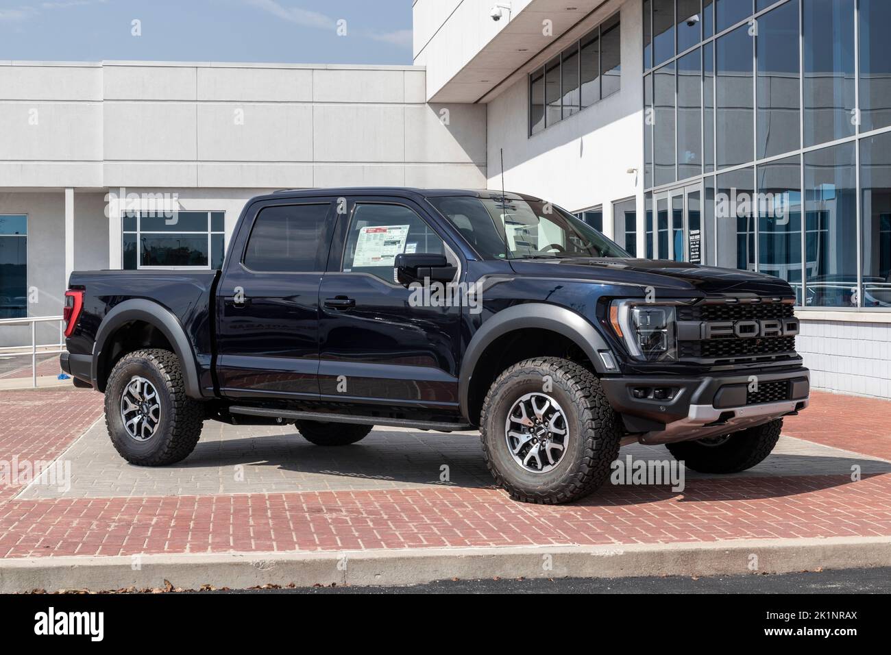 Fishers - Circa September 2022: Ford F-150 Raptor display at a dealership. The Ford F150 is available in XL, XLT, Lariat, King Ranch, Platinum, and Li Stock Photo