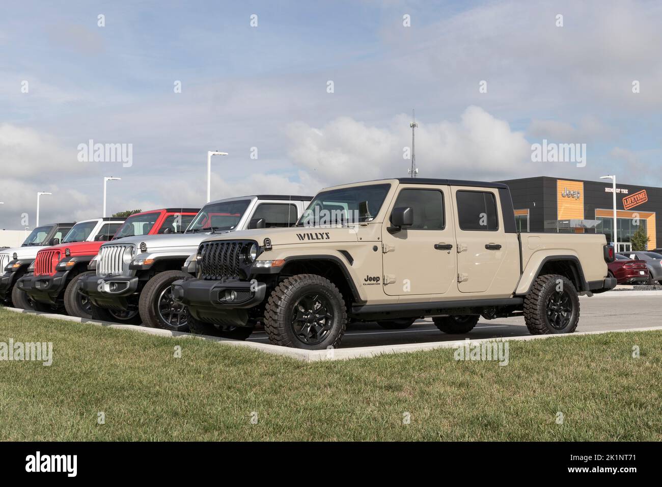 Tipton - Circa September 2022: Jeep Gladiator display at a Stellantis dealer. The Jeep Gladiator models include the Sport, Willys, Rubicon and Mojave. Stock Photo