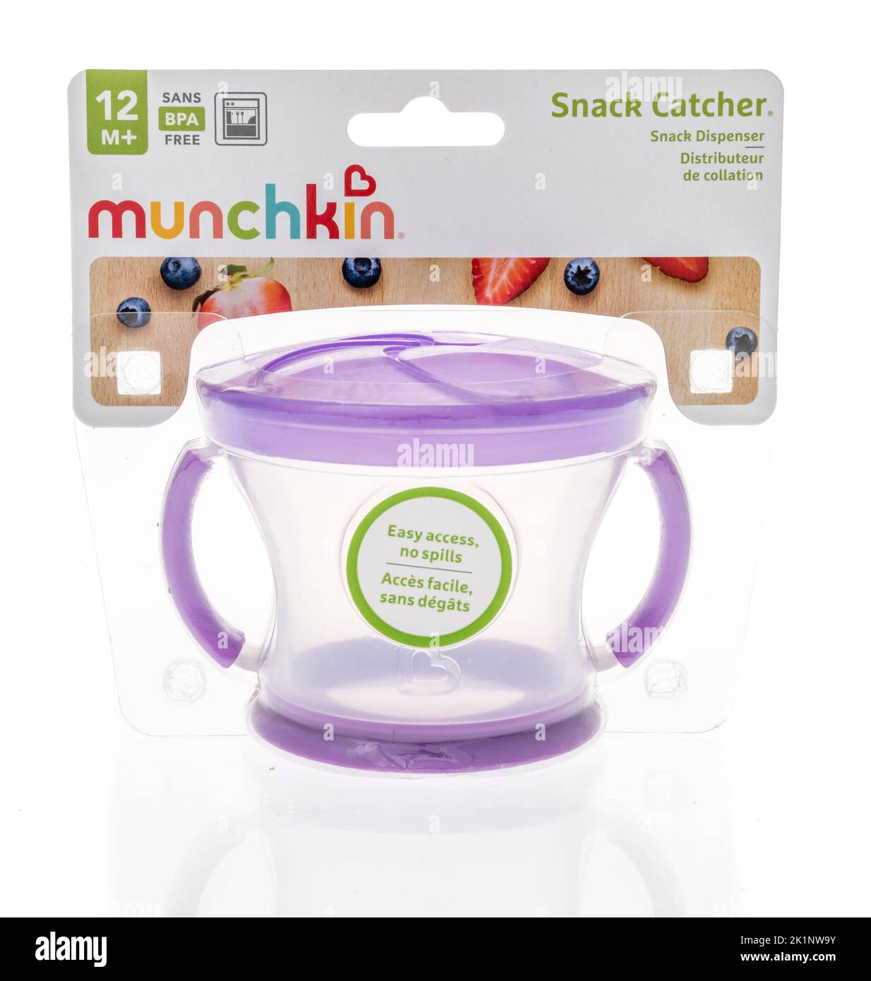 Winneconne, WI - 18 August 2022: A package of Munchkin snack catcher snack dispenser on an isolated background. Stock Photo
