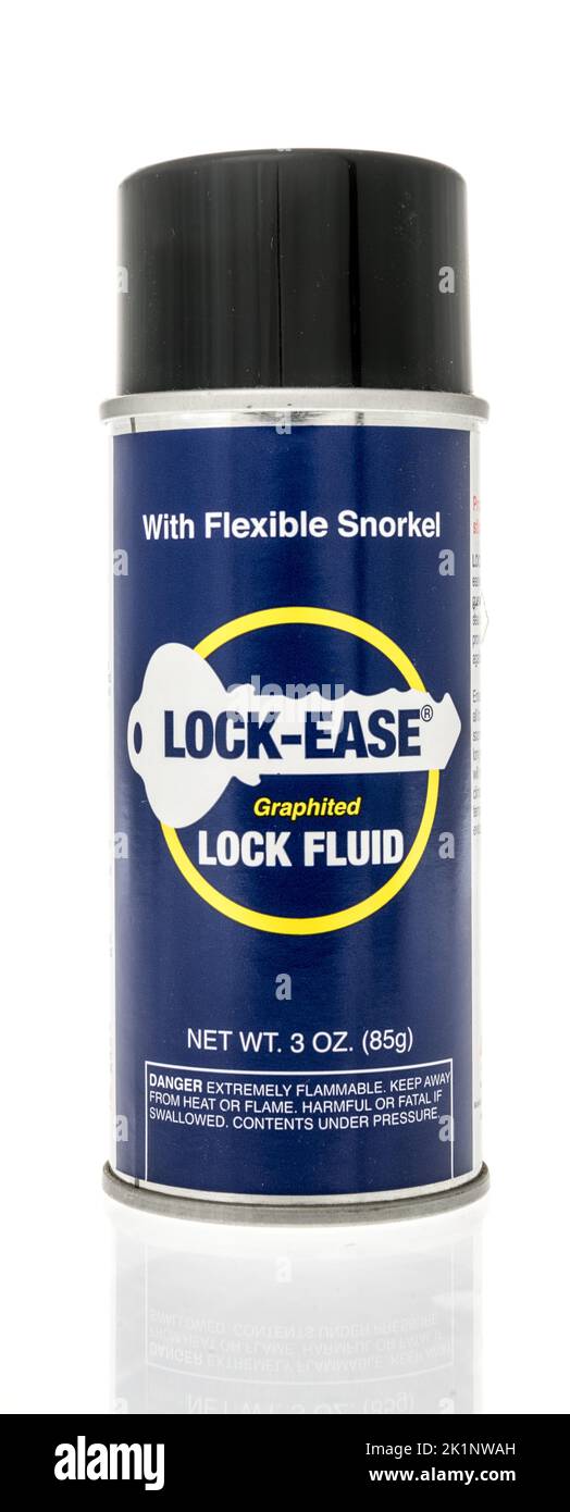 Winneconne, WI - 18 August 2022: A can of AGS lock ease graphite lubricant lock ease lock fluid on an isolated background. Stock Photo