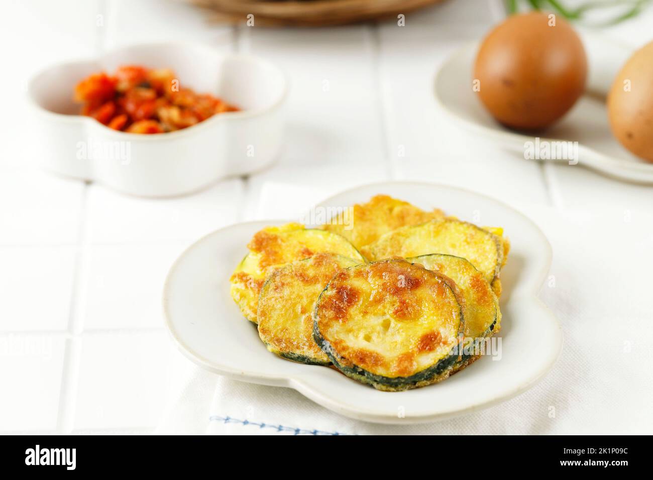 Hobak Jeon, Korean Green Zucchini Pancake. Pan Fried Sliced Zucchini
