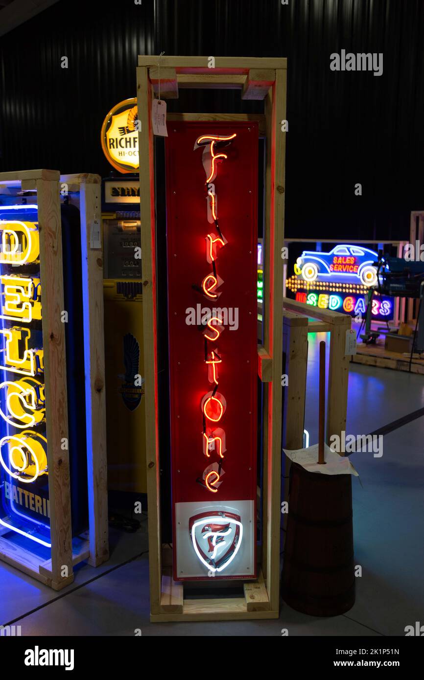 A neon Firestone Tires sign awaits auction at Worldwide Auctioneers in Auburn, Indiana, USA. Stock Photo