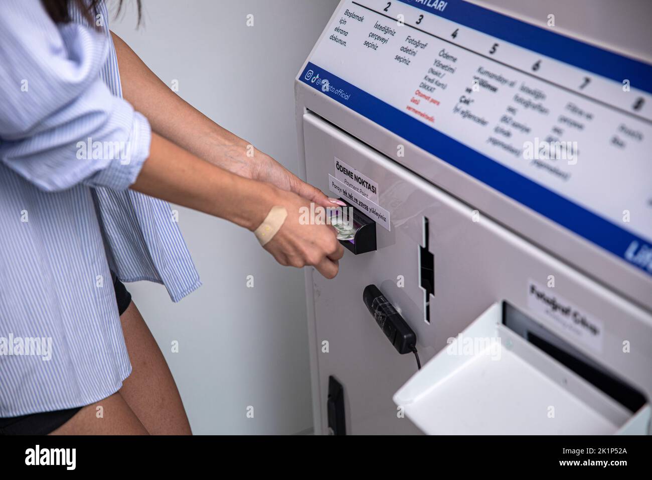 Inside The Cabin A Girl Seen Putting Money Into The Machine Before