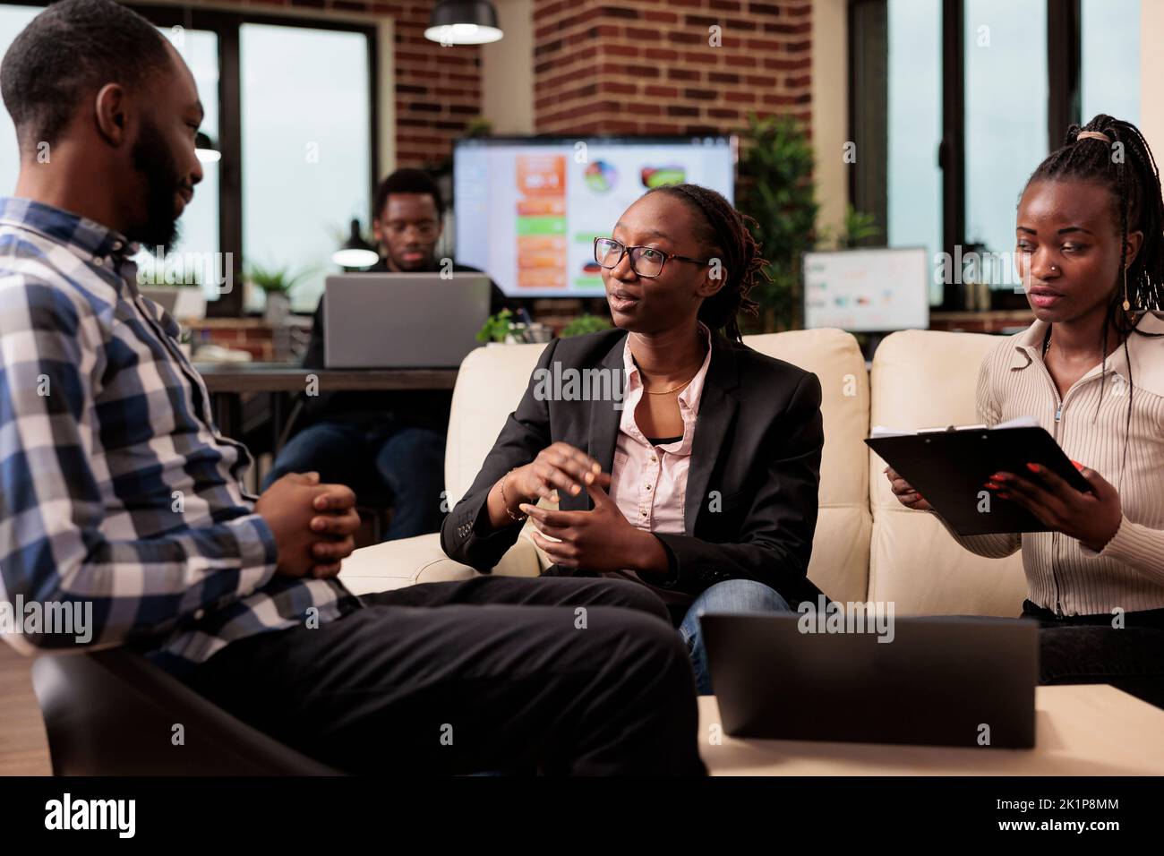 Office colleagues brainstorming ideas at work, planning project