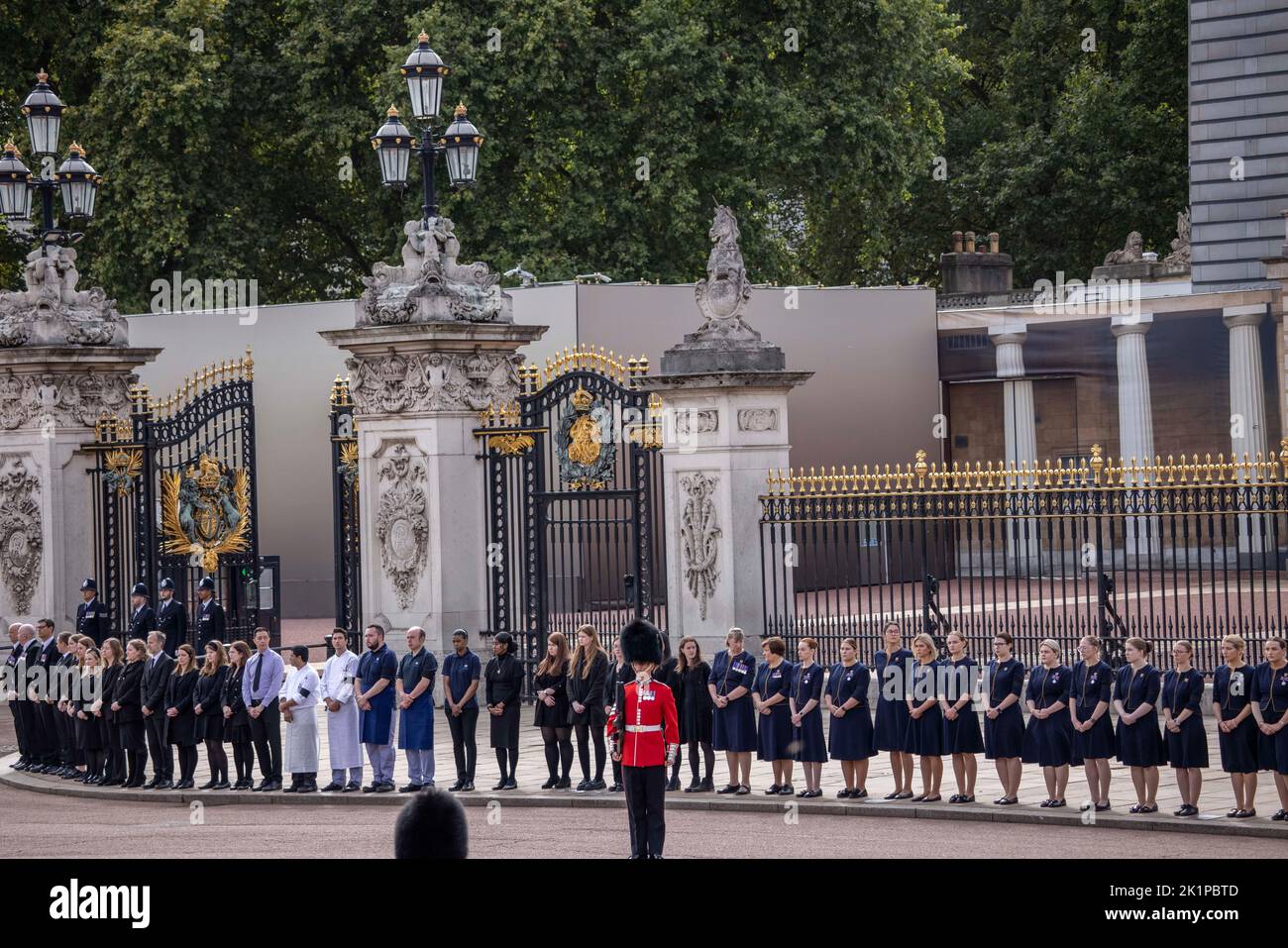 London, UK. 19th Sep, 2022. Buckingham Palace staff stand outside the front ready to pay their