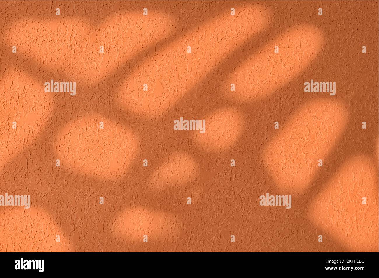 Shadow and light on solid orange wall texture background Stock Photo