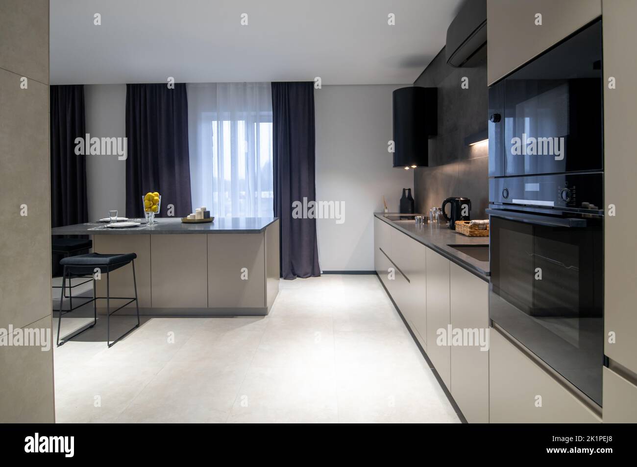 Smart kitchen interior with builtin household appliances Stock Photo