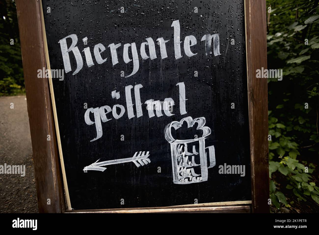 Sign saying beer garden open, in German Biergarten geöffnet Stock Photo