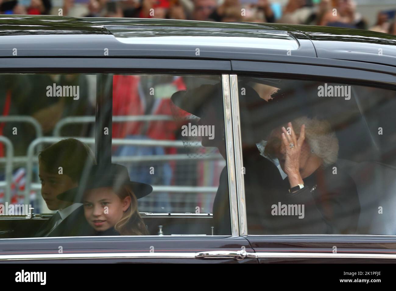 London, UK. 19th Sep, 2022. Queen Consort Camilla, Princess Kate, Prince George and Princess Charlotte are travelling to Westminster Cathedral for the state funeral of Queen Elizabeth II Stock Photo
