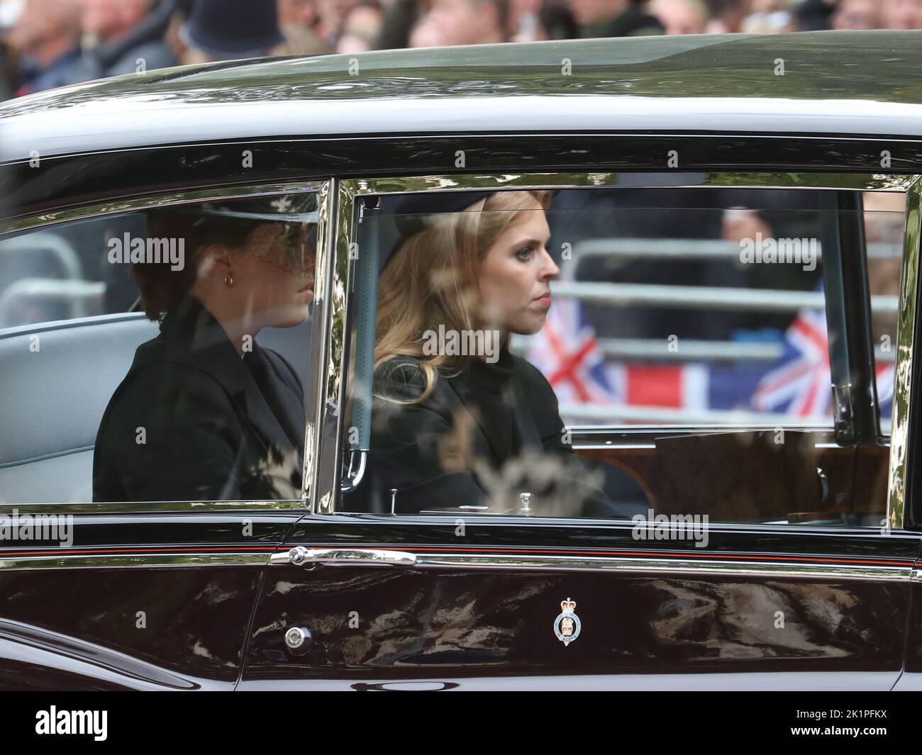 London, UK. 19th Sep, 2022. Princess Beatrice and Princess Eugenie folllow the courtege of the funeral of Queen Elizabeth II. Stock Photo