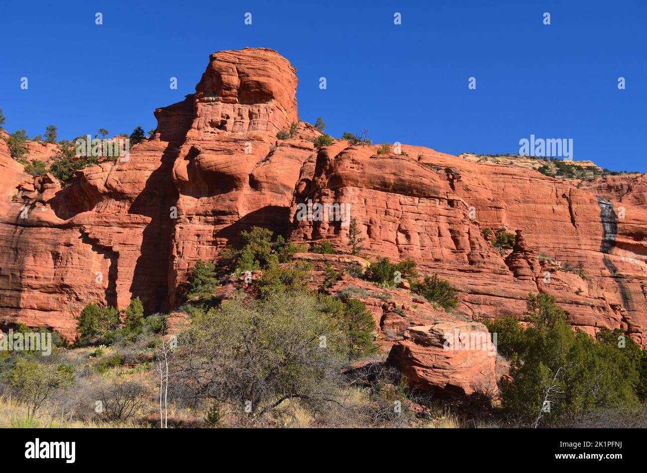 Beautiful dark red rock cliff and rock formation in Sedona Arizona