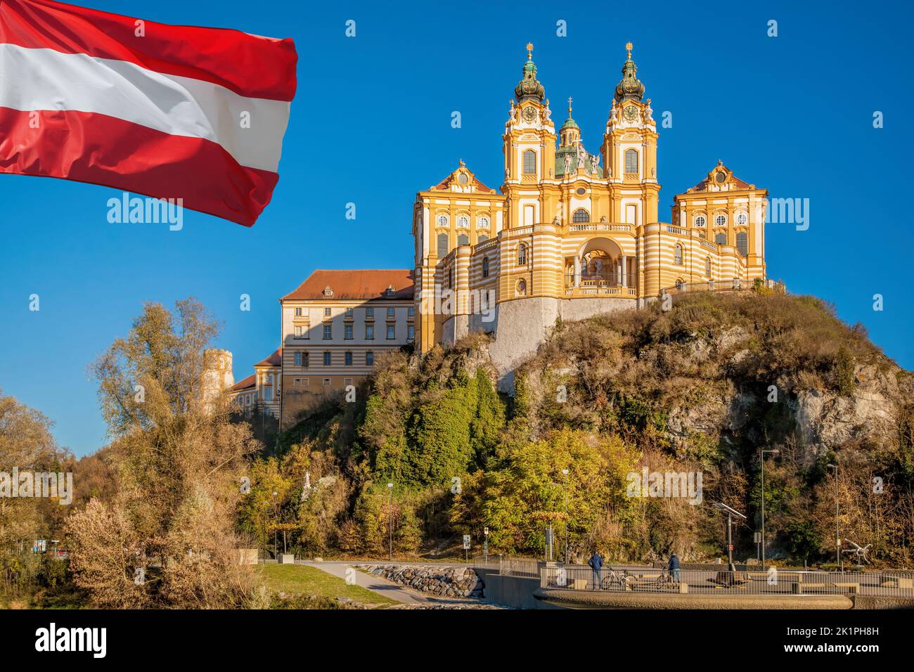 Melk abbey with austrian flag in Wachau valley, Melk, Austria, UNESCO Stock Photo