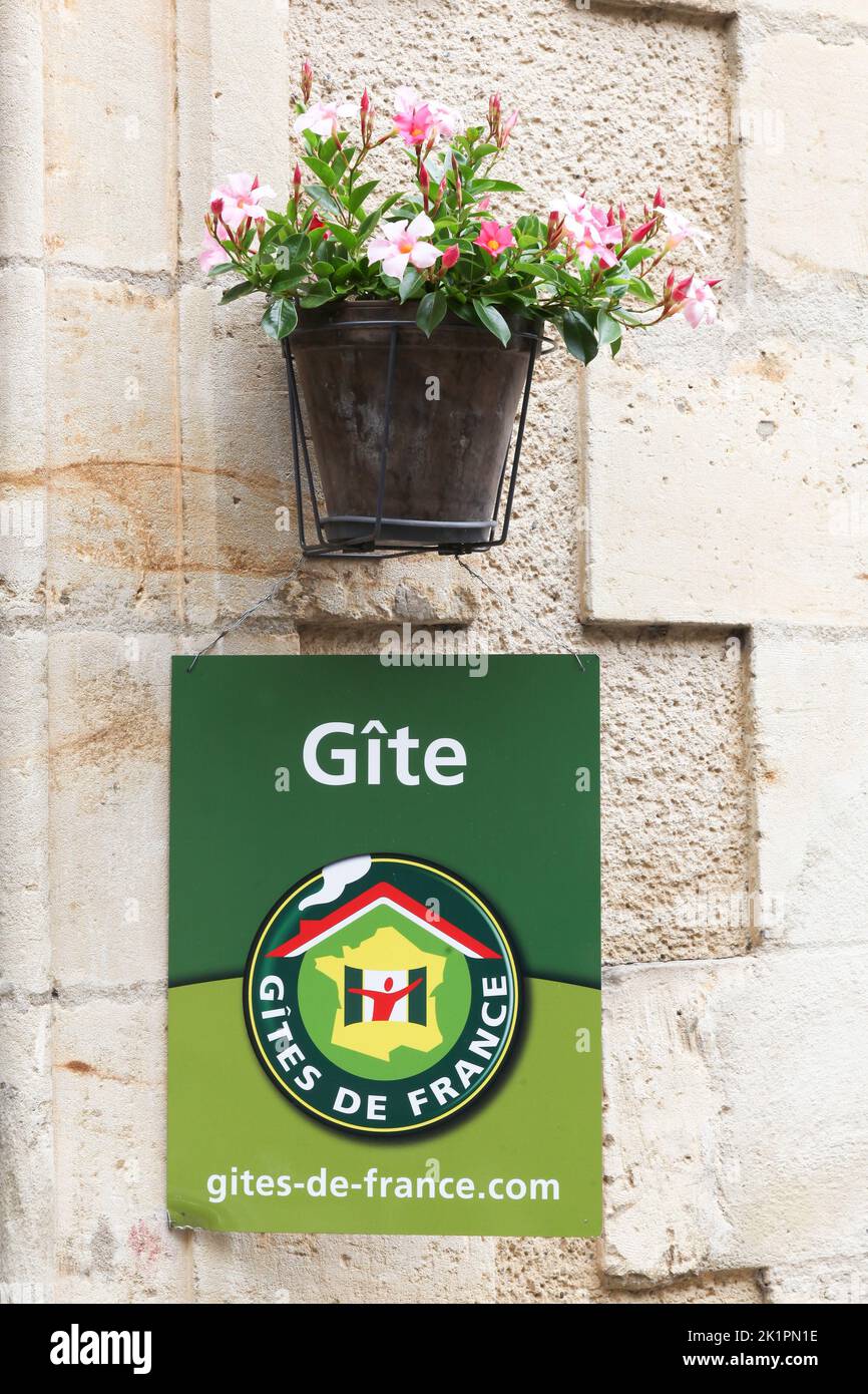 Villefranche du Perigord, France - June 26, 2021: Gites de France sign on a wall. Gites de France is a holiday home in France available for rent Stock Photo