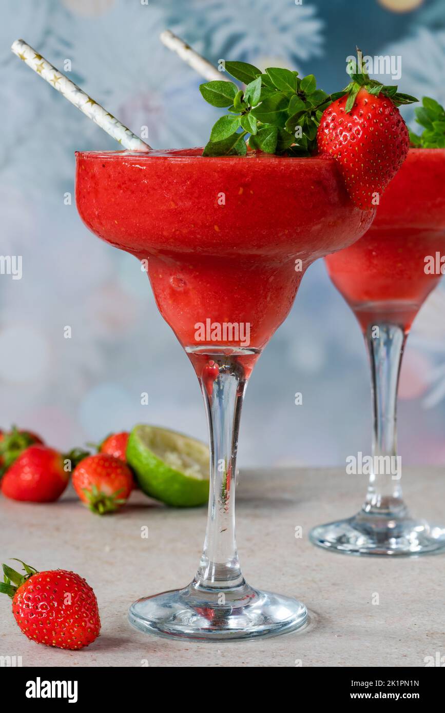 Frozen strawberry daiquiri with white rum garnished with fresh fruit