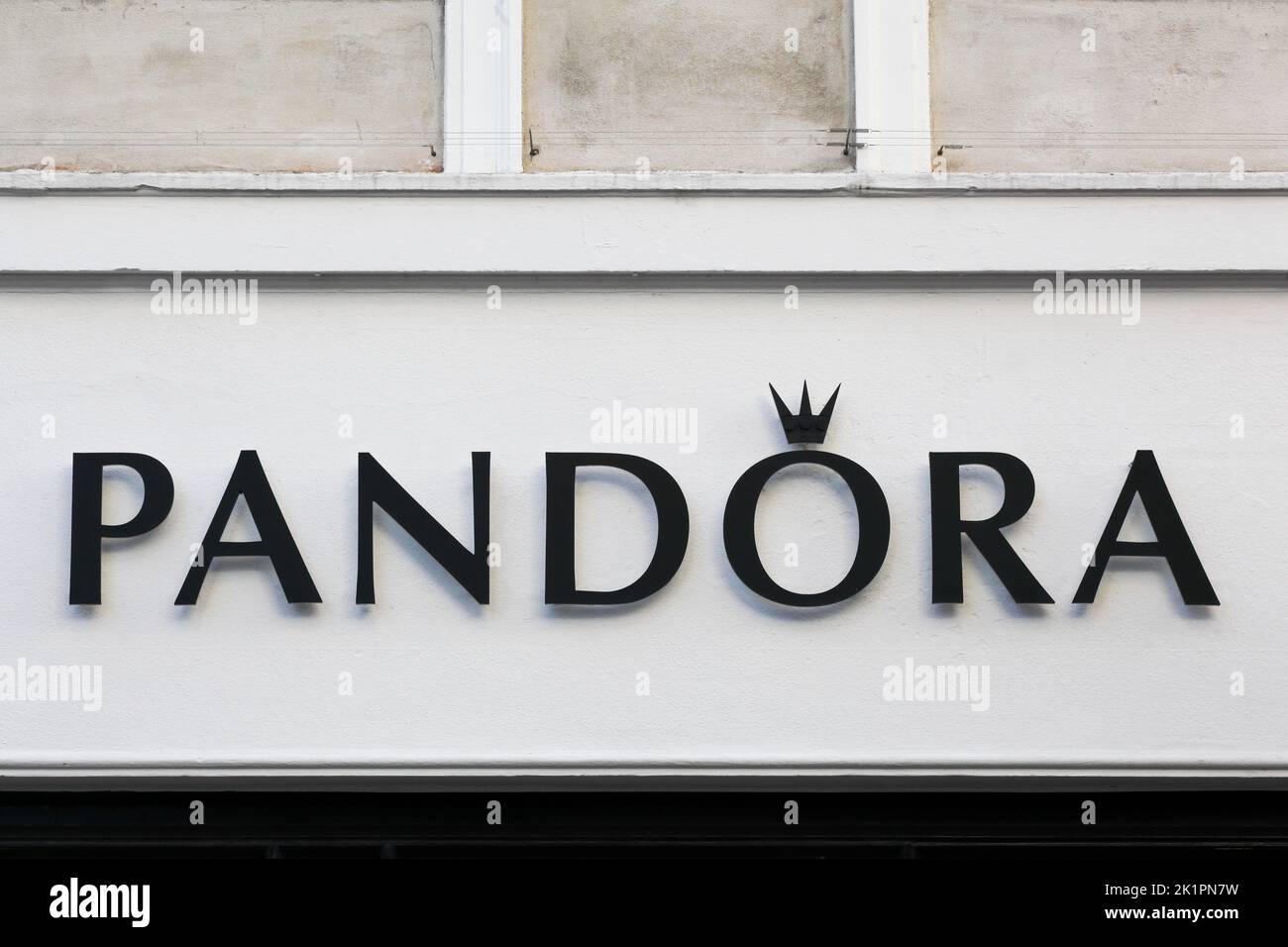 Copenhagen, Denmark - October 14, 2021: Pandora logo on a wall. Pandora is a Danish jewellery manufacturer and retailer founded in 1982 Stock Photo