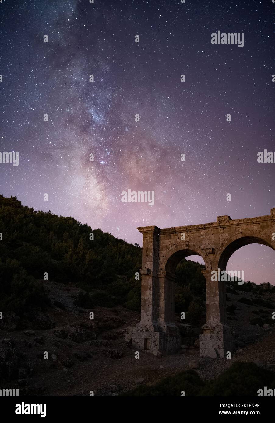 The ancient city of Ariassos, the city gate in a night when the Milky Way is visible Stock Photo