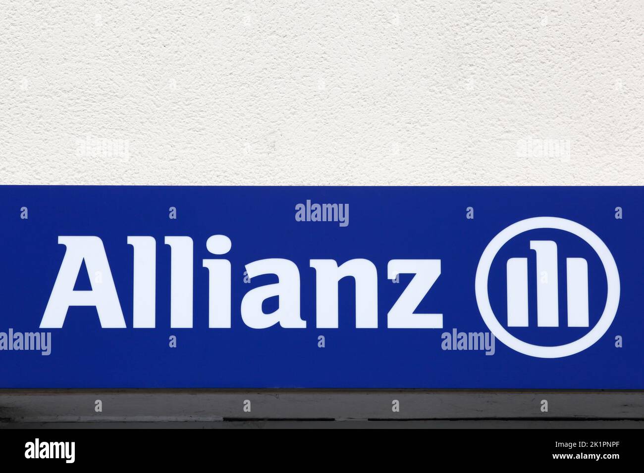 Gourdon, France - June 26, 2021: Allianz sign on a wall. Allianz is a European financial services company headquartered in Munich, Germany Stock Photo