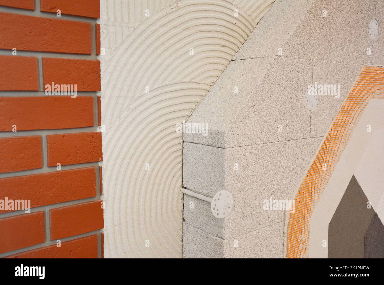 House brick wall renovation, insualtion with glue plastering layers