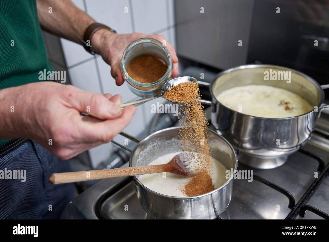 A chef adding spice on bowl during Ayurvedic cooking Stock Photo - Alamy