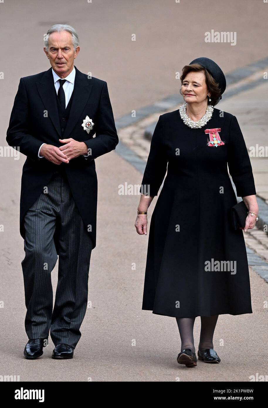 Former prime minister Tony Blair and his wife Cherie Blair arrive for