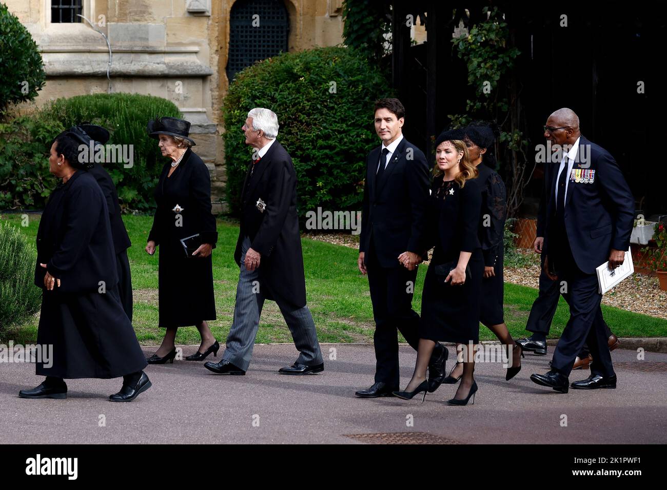 Former prime minister John Major and his wife Norma and the Prime Minister of Canada Justin Trudeau and his wife Sophie Trudeau, arrive ahead of the Committal Service of Queen Elizabeth II at St George's Chapel at Windsor Castle in Berkshire. Picture date: Monday September 19, 2022. Stock Photo