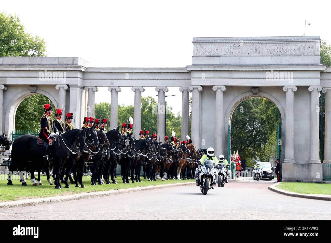 Members of the Royal Horse Artillery stand guard as the State Hearse