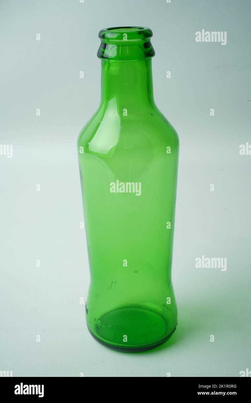 Glass bottles of soda on white background Stock Photo - Alamy