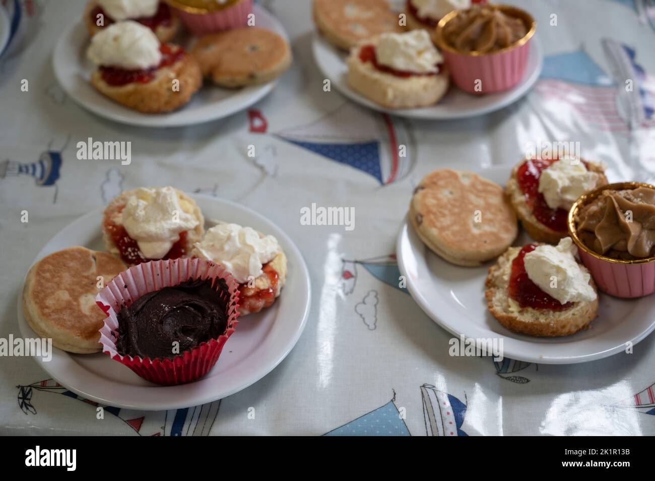 Wales, Pembrokeshire. Dale village. Cream tea in aid of local charity. Stock Photo