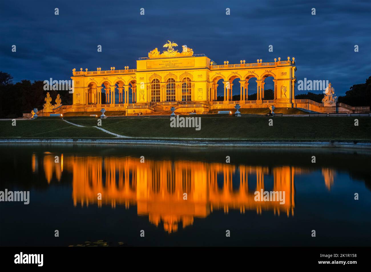 The illuminated Gloriette monument in the back courtyard of Schoenbrunn Palace. Photo taken on the 14th of September 2022 in Vienna, Austria Stock Photo
