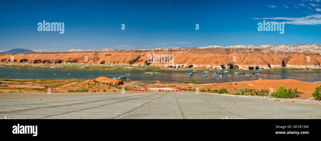 Abandoned boat ramp, due to low water level, boats at Bullfrog Bay at