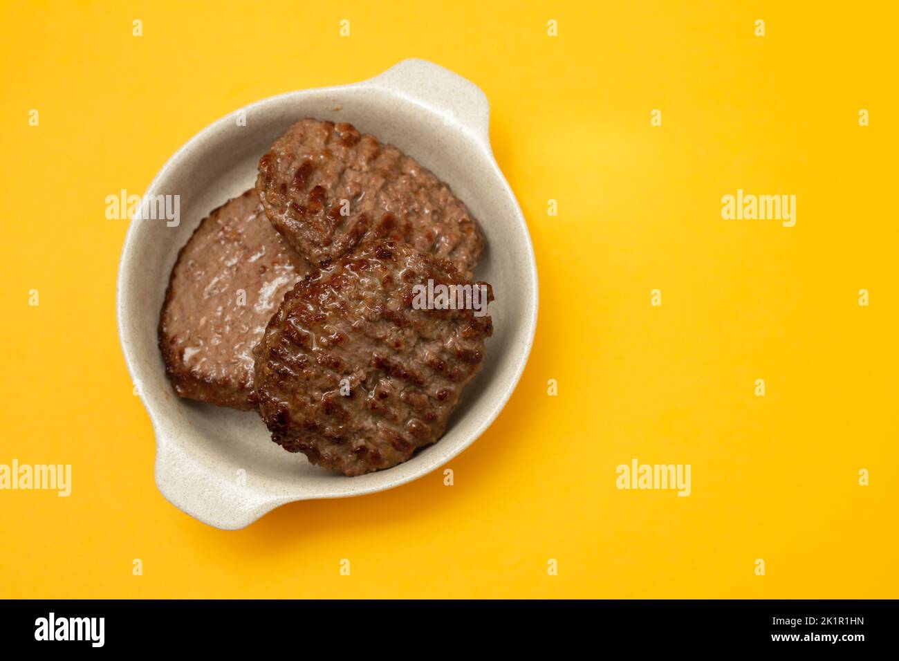 three fried ground meat in light brown bowl Stock Photo Alamy